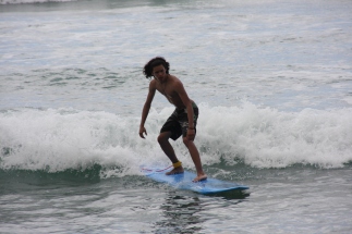 Surfing White Plains Beach, Barbers Point , Oahu